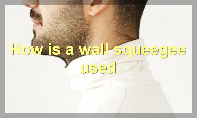 How is a wall squeegee used